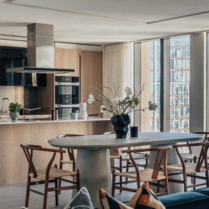 33rd-Floor Three-Bedroom Residence with Panoramic River and Skyline Views